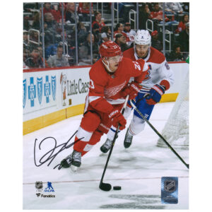 Lucas Raymond Detroit Red Wings Autographed 8" x 10" Red Jersey with Puck Photograph
